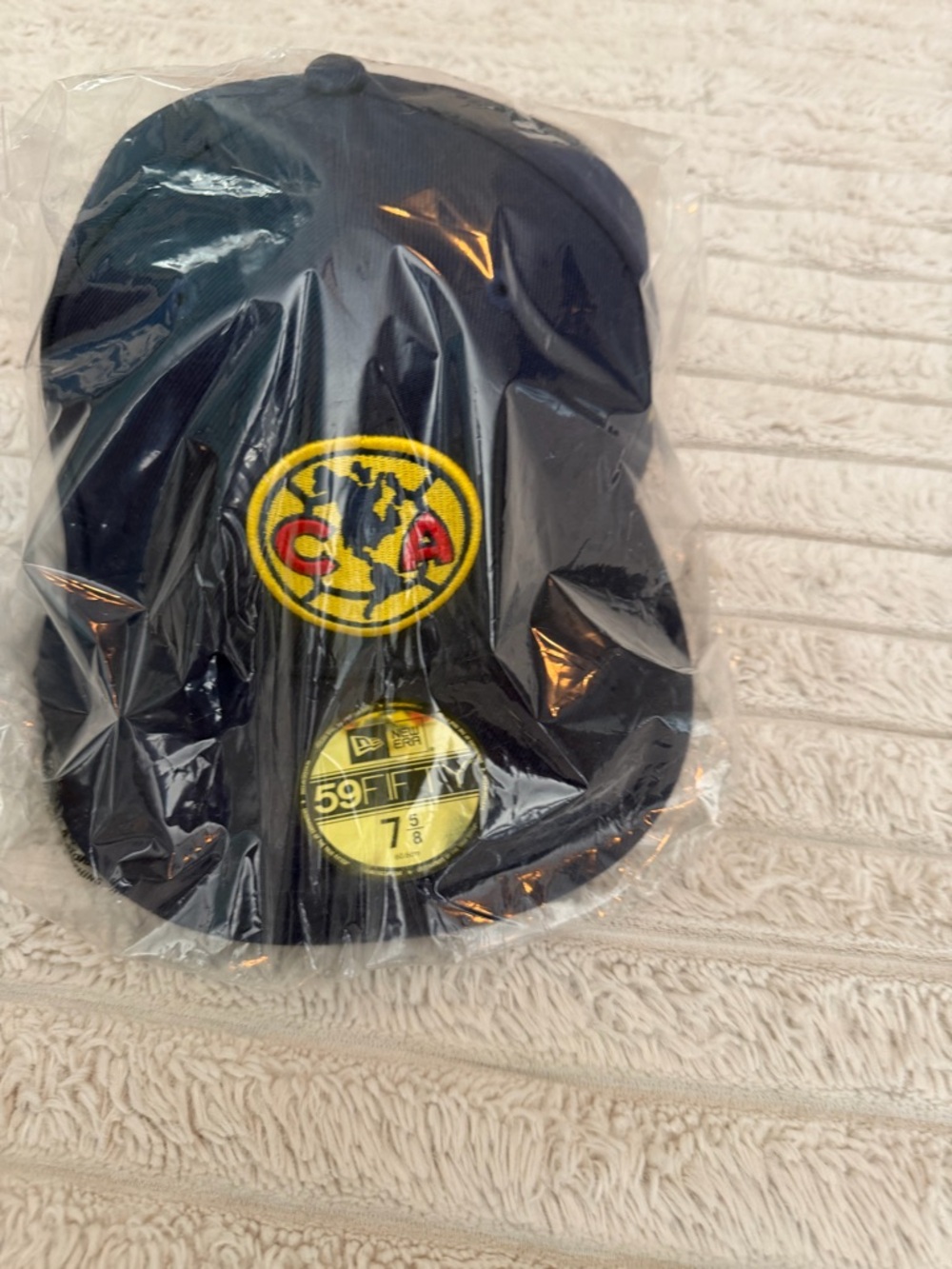 New Era Black Baseball Cap with Yellow and Red Club Logo